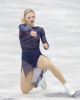 演技を終え、渾身のガッツポーズを決める米国のアンバー・グレン＝ミラノ・アイススケートアリーナ（撮影・吉澤敬太）