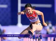 　女子１００メートル障害予選で力走する田中佑美（共同）