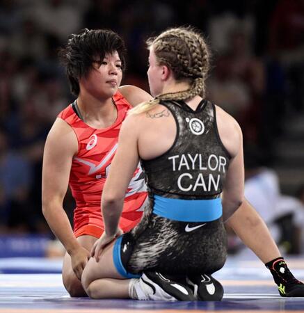 　女子57キロ級１回戦、カナダ選手を破った桜井つぐみ（共同）