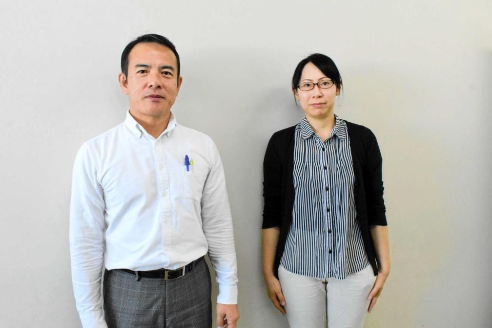 　沖縄県庁空手振興課の佐和田勇人さん（左）と崎原恭子さん