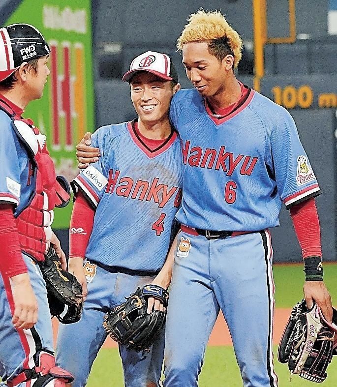 宗（右）と福田