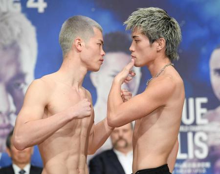 　計量を終え、にらみ合う那須川天心（左）と与那覇勇気（撮影・棚橋慶太）