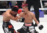 　５回、パンヤ・プラダブシーに左ボディーを放つ重岡優大（撮影・金田祐二）