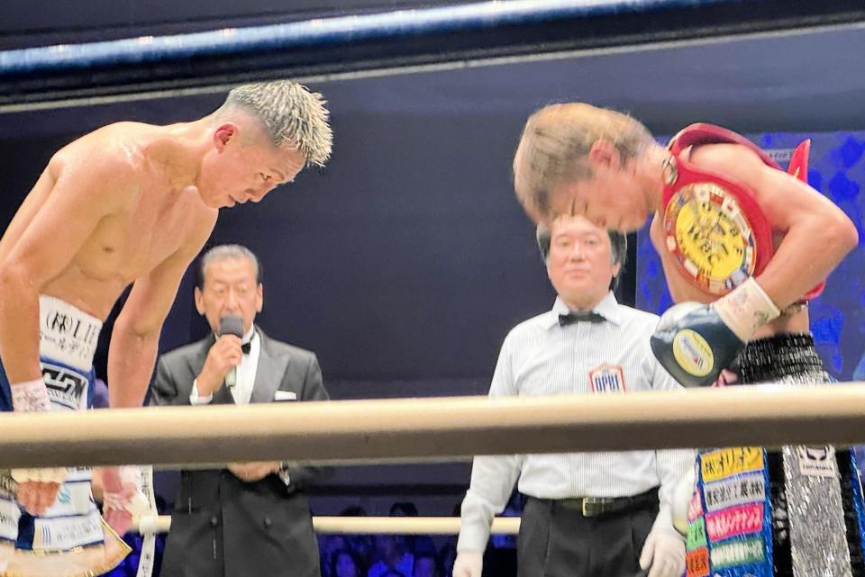 　引き分けで王座獲得を逃した神足茂利（左）と２度目の防衛に成功した波田大和