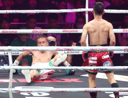 　５回、松本流星（右）との偶然のバッティングで倒れ込む高田勇仁（撮影・西岡正）