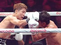 　５回、ムロジョン・アフマダリエフ（右）に右フックを浴びせる井上尚弥（撮影・西岡正）