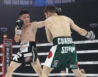 　５回、カルロス・クアドラスを攻める坪井智也（左）＝撮影・石井剣太郎）