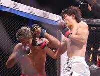 　賢民（左）を攻める細川一颯（撮影・佐々木彰尚）