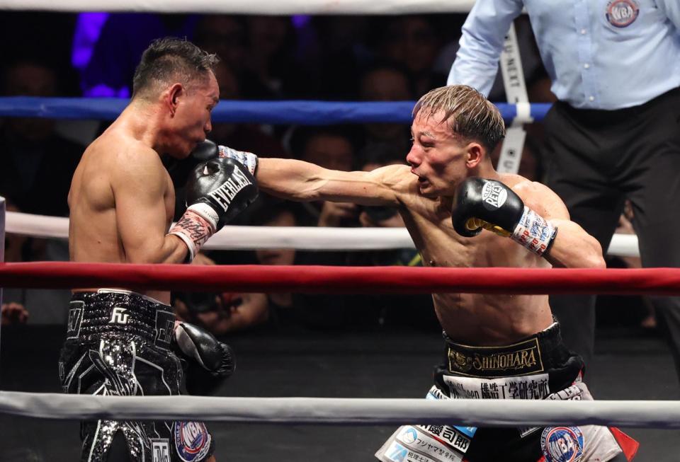 　１１回、ノニト・ドネアを攻める堤聖也（撮影・金田祐二）