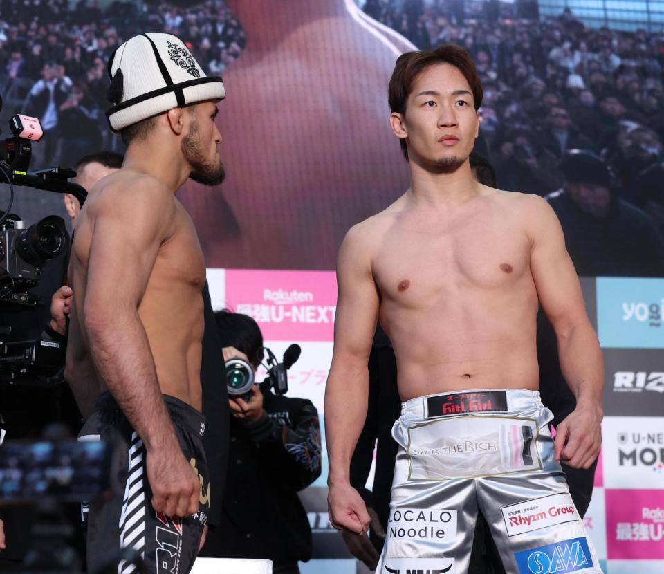 　計量を終え、気迫のこもった表情の朝倉未来（右）＝撮影・金田祐二