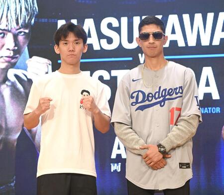 会見に登場した高見亨介（左）とアヤラ＝８日