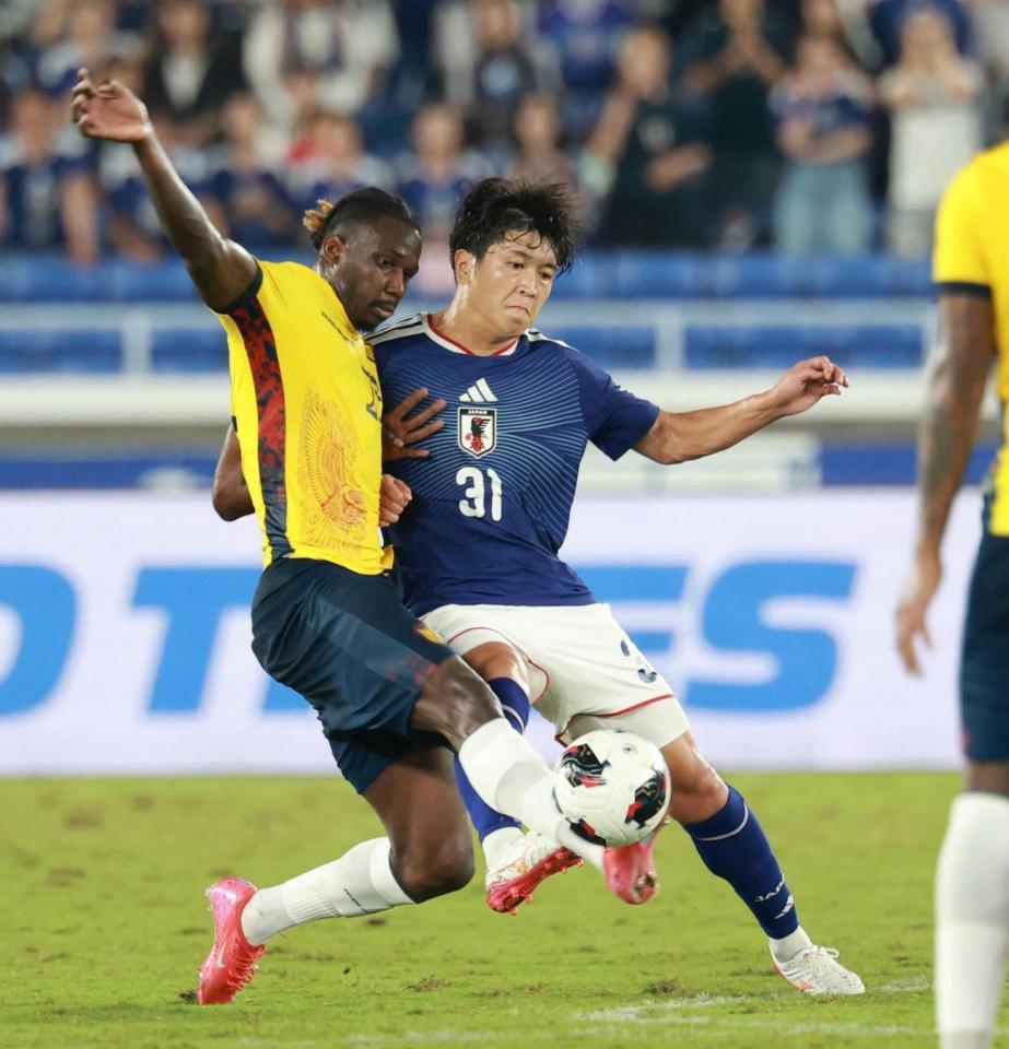 　前半、競り合う谷村