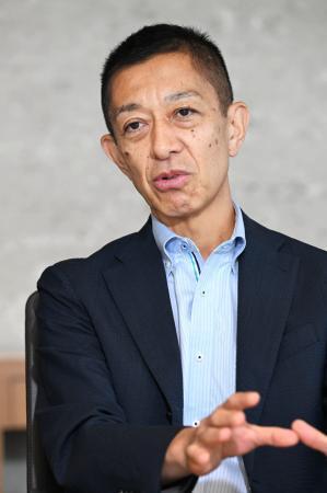 　インタビューに答える日本政策投資銀行社長の牧裕文氏