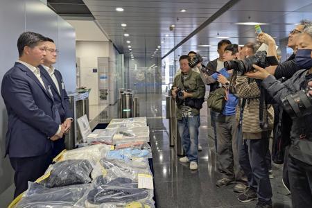 香港１０億円強奪で１５人逮捕　計画的犯行か、警察発表