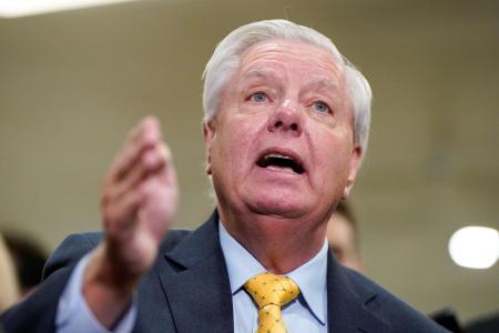 　記者団に話すグラム氏＝３日、ワシントン（ロイター＝共同）