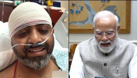 　２日にビデオ通話するインドのモディ首相（右）とスミット・マッチャール機長（モディ首相のユーチューブ映像から、ＡＰ＝共同）