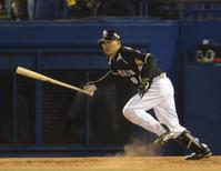 　５回、福留は中前タイムリーを放つ