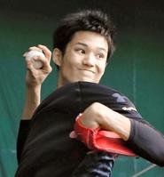 　ブルペン入りしチェンジアップを投げる藤浪（撮影・持木克友）