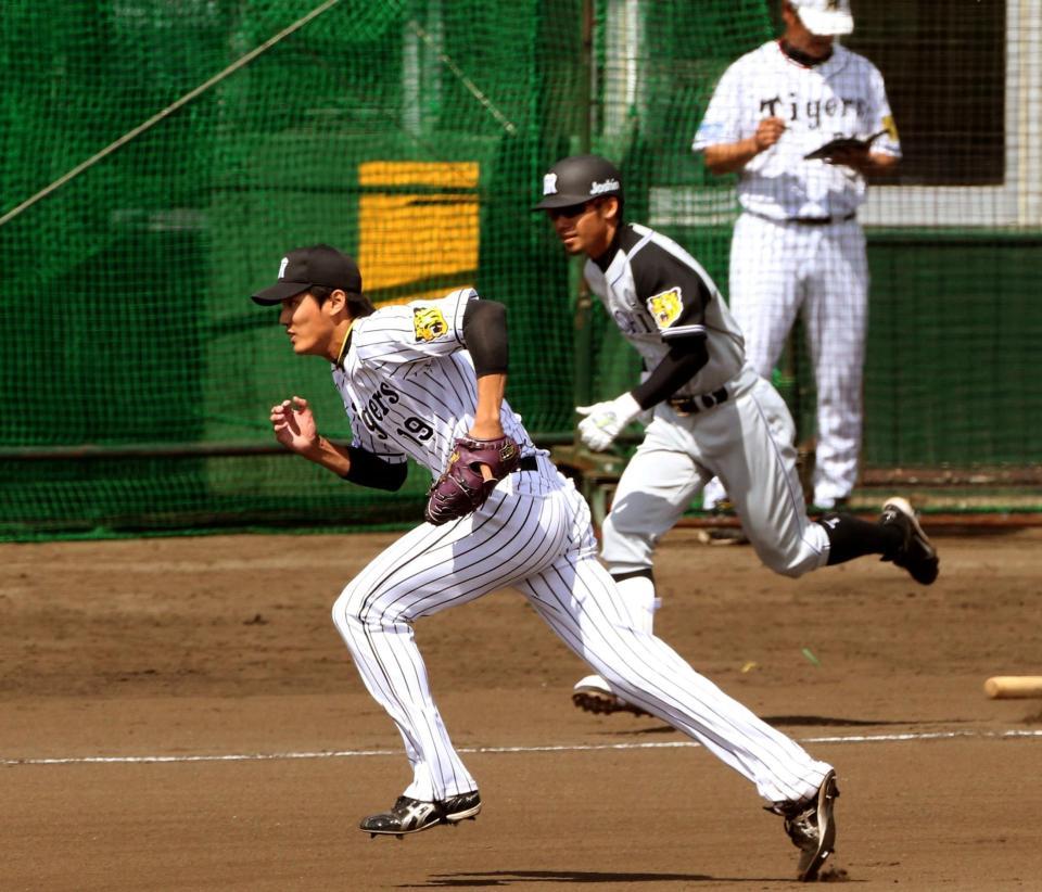 １回、阪神・鳥谷敬を一塁ゴロに打ち取りベースカバーに走る阪神・藤浪晋太郎＝宜野座（撮影・田中太一）