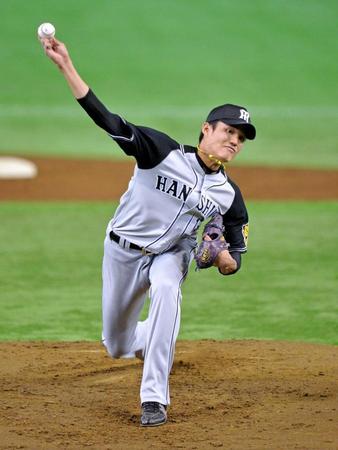 巨人打線を相手に力投する藤浪（撮影・西岡正）