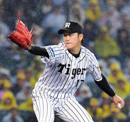 雨の中力投する阪神・岩貞祐太＝甲子園（撮影・高部洋祐）