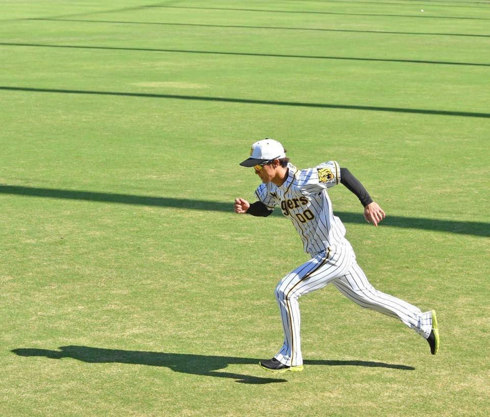 　ランニングする上本