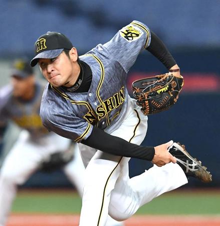 　力投する中田（撮影・北村雅宏）