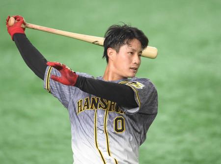 　ロングティーで汗を流す木浪