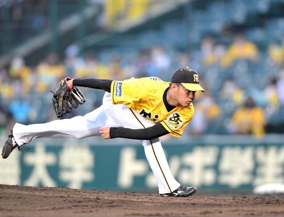 　低い姿勢から力強く投げ込む先発の高橋