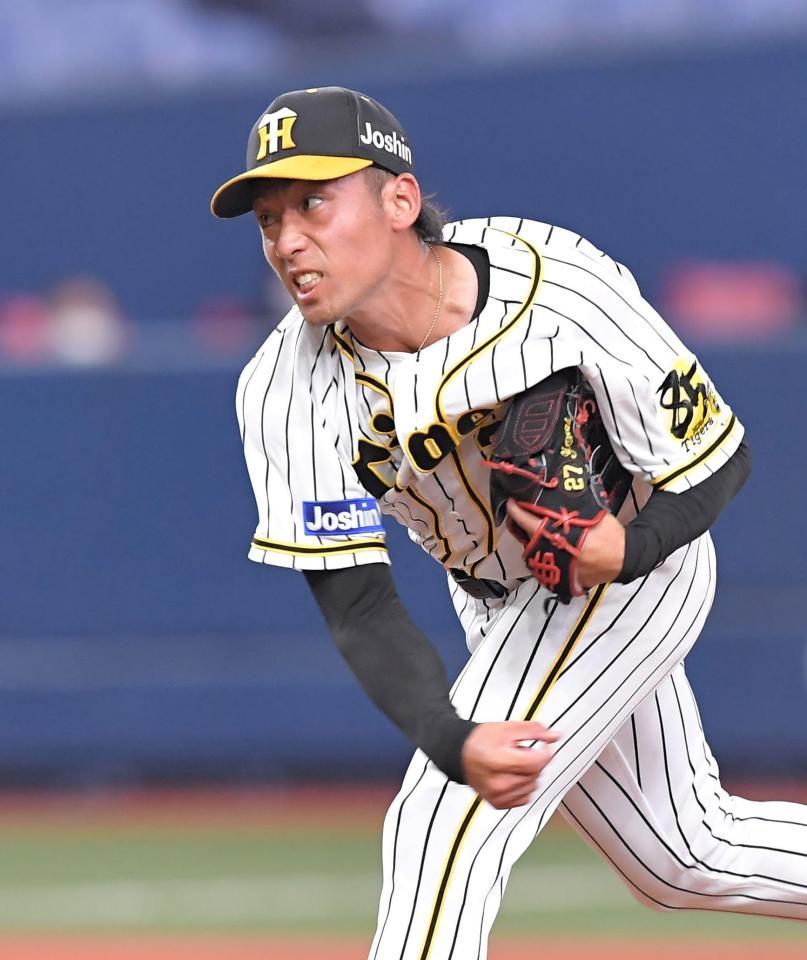 力投する尾仲（撮影・高部洋祐）