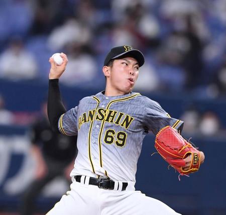 　７回力投する阪神・石井大智（撮影・山口登）