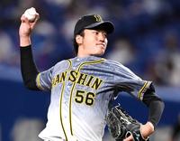 　７回を無失点に抑える小林