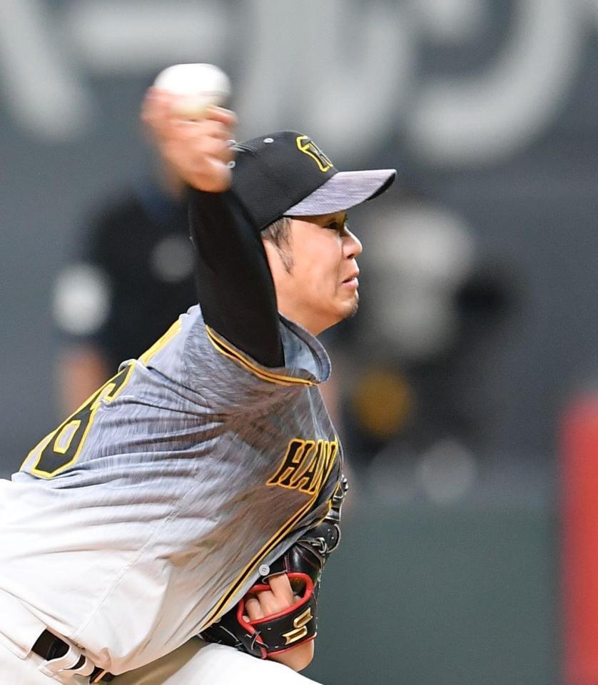日本ハム打線を相手に力投する西勇＝札幌ドーム（撮影・西岡正）