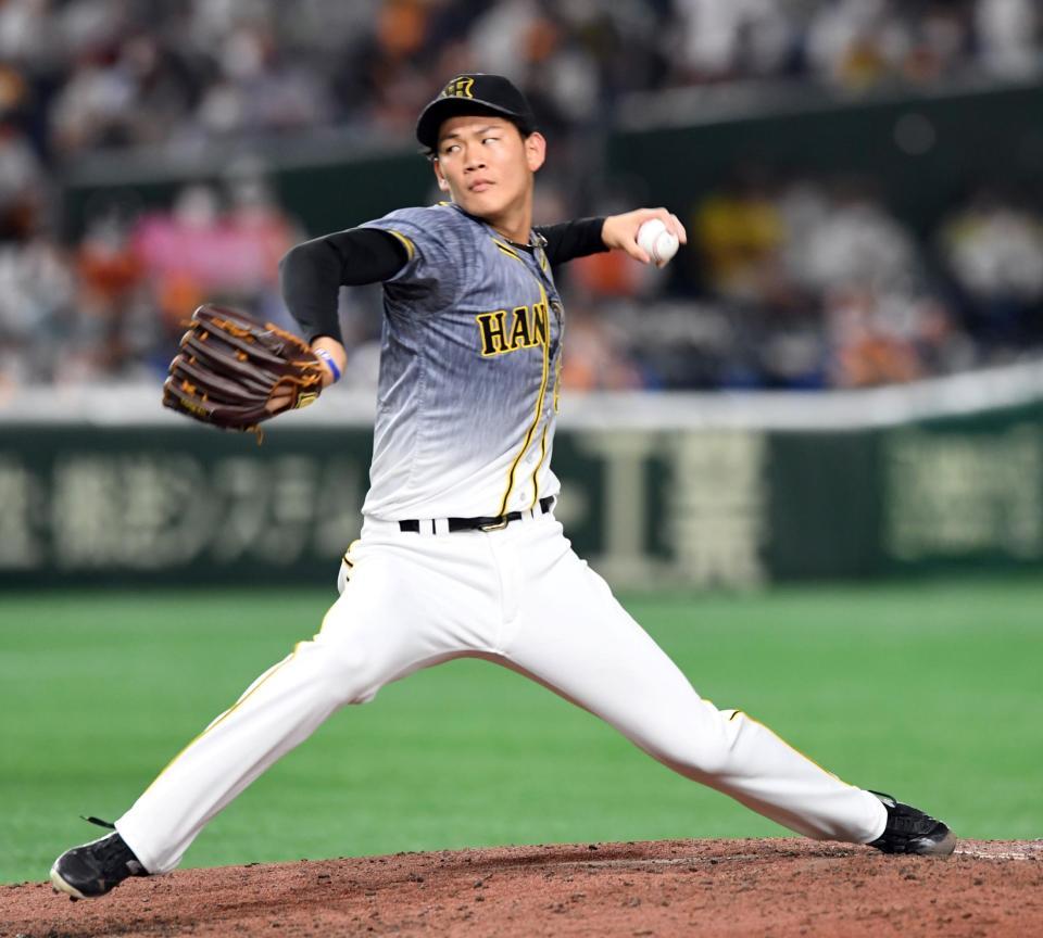 　６回裏に３番手で登板し３者凡退に抑えた阪神・及川＝東京ドーム（撮影・佐藤厚）