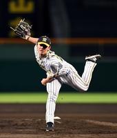 　力投する伊藤将