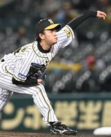 １回、力投する阪神先発の高橋（撮影・飯室逸平）