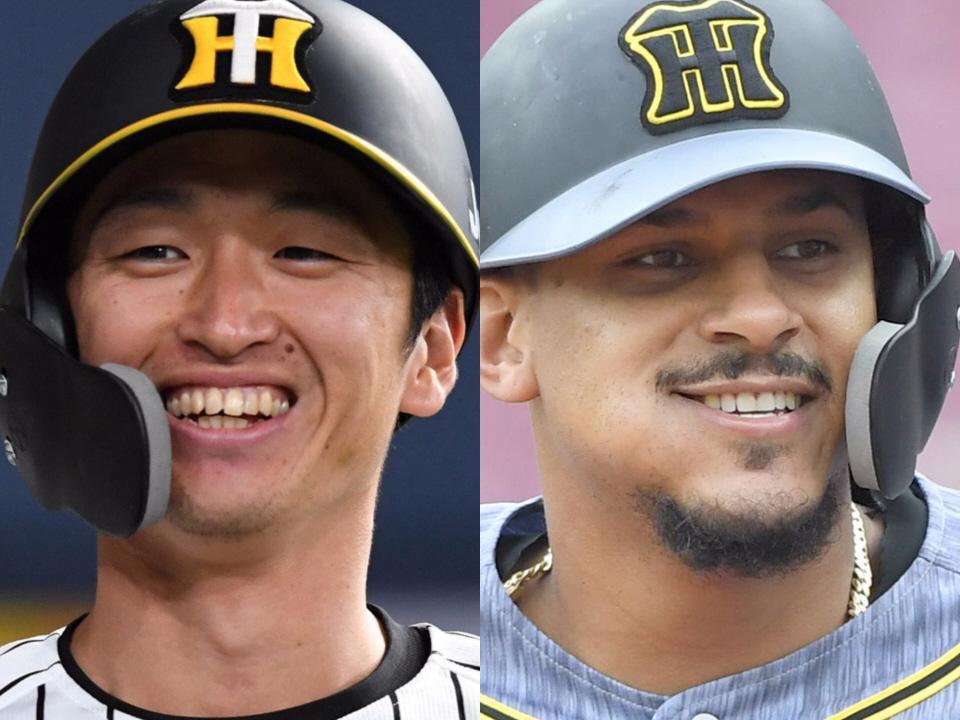 　ベストナインを初受賞した近本（左）とマルテ