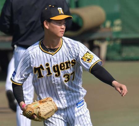 　右脇腹を痛めた及川