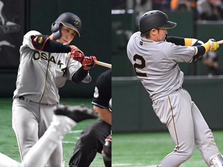 　９回に本塁打を放った木浪（左）と梅野