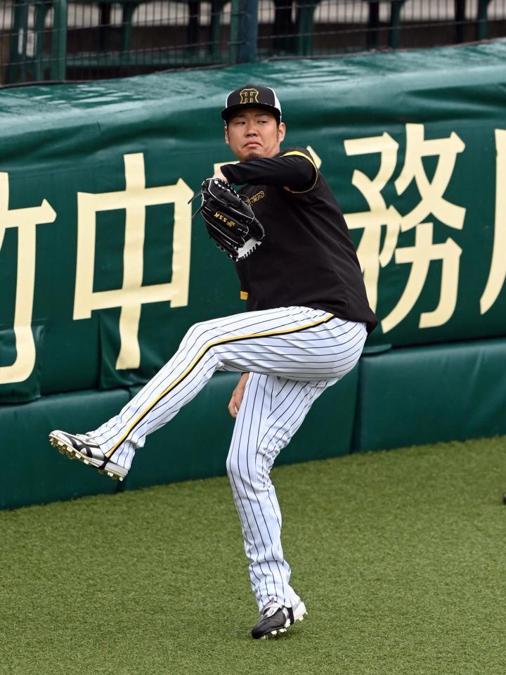キャッチボールする西勇（撮影・山口登）