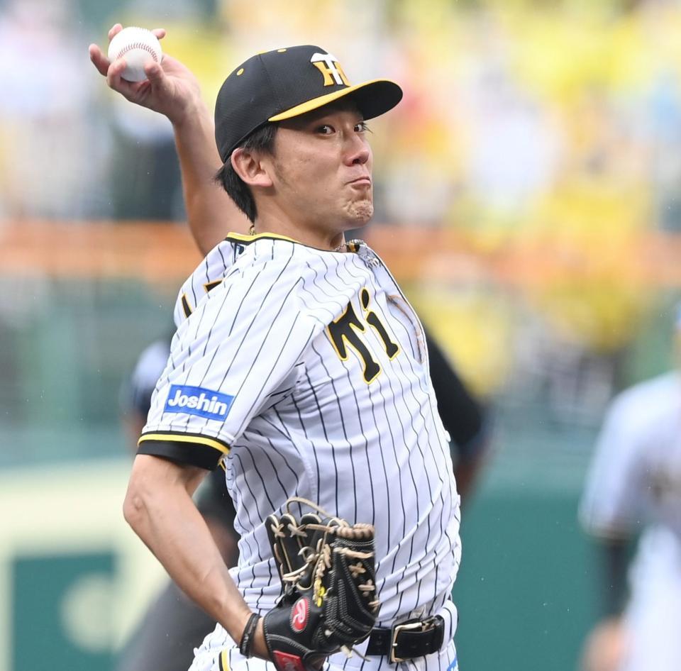 　粘りの投球で中日打線を抑える伊藤将（撮影・飯室逸平）