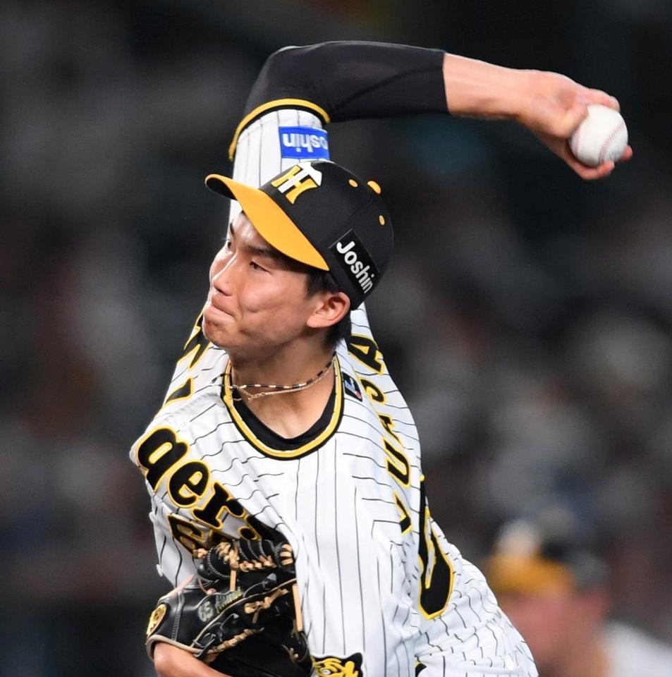 　８回を無失点に抑える湯浅（撮影・田中太一）