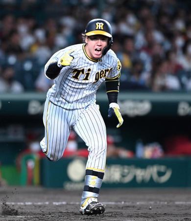 　４回、２点タイムリーを放ち雄叫びを上げる梅野（撮影・飯室逸平）