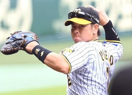 　スローイングの練習をする梅野（撮影・田中太一）