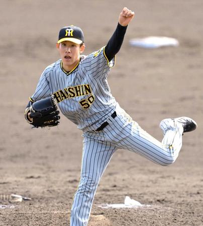 　力投する富田（撮影・高部洋祐）