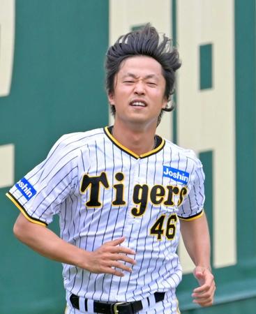 　走り込みをして汗を流す島本