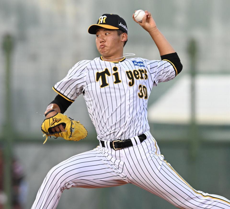 　力投する門別（撮影・金田祐二）