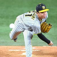 　力投する先発の村上