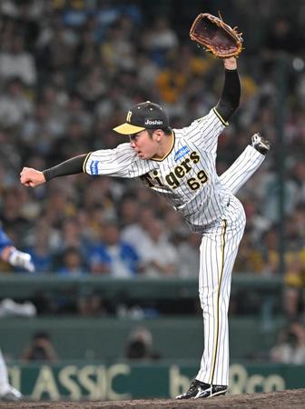 　力投する石井（撮影・高部洋祐）