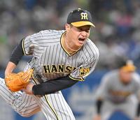 　雄たけびを上げながら力投する大竹